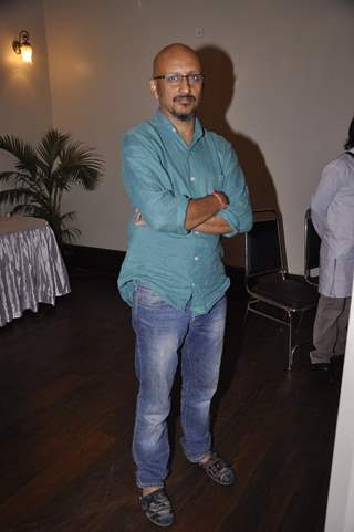 Shantanu Moitra poses for the media at Bimal Roy's Book Launch