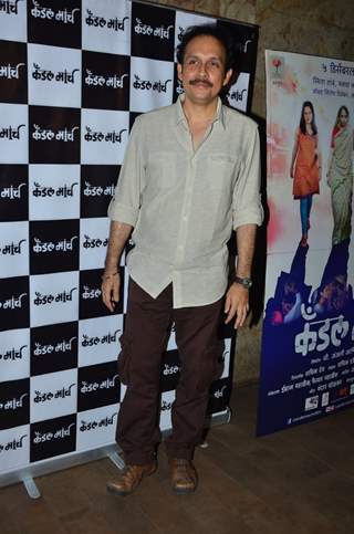 Tushar Dalvi poses for the media at the Special Screening of Candle March