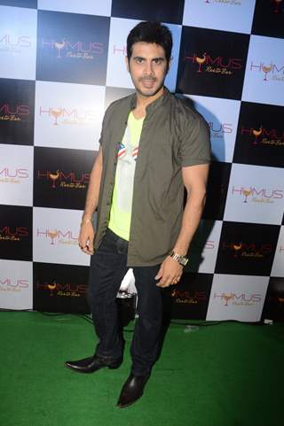 Kaishav Arora poses for the media at A Soiree Evening at HYMUS