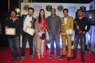 Team of EVEREST poses for the media at Lion Gold Awards