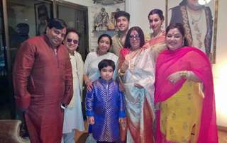 Celebs pose for the media at Bappi Lahiri's Saraswati Pooja