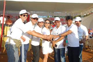 Celebs pose for the media at Cricket for Peace