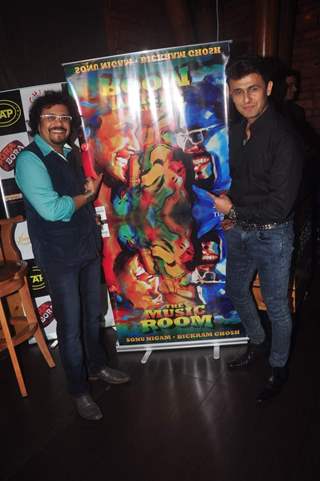 Sonu Nigam and Bickram Ghosh pose for the media at their Album Launch
