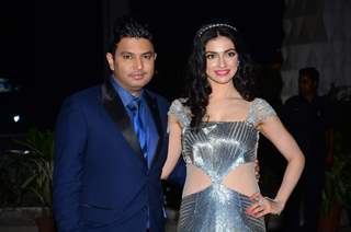Bhushan Kumar poses with wife Divya Kumar at Tulsi Kumar's Wedding Reception