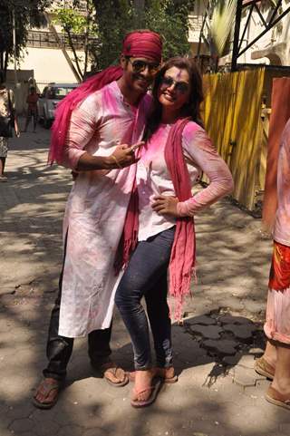 Deepshikha Nagpal and Kaishav Arora pose for the media at Shabana Azmi's Holi Bash