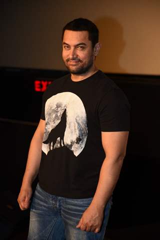 Aamir Khan poses for the media at the DVD Launch of P.K.