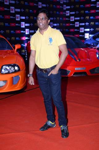 Anand Kumar poses for the media at the Premier of Fast & Furious 7