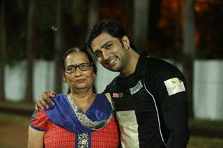 Aadesh Chaudhry poses with mother at Gold Charity Match