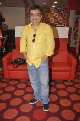 Swanand Kirkire poses for the media at the Promotions of Masaan on Red FM