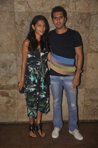 Ritesh Sidhwani poses with his wife at the Screening of Bajrangi Bhaijaan