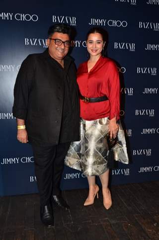 Simone Singh poses with Farhad Samar at the Launch of Jimmy Choo Eyewear Launch