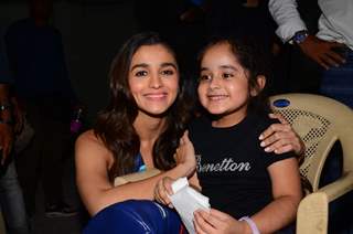 Alia Bhatt poses with a fan at Mehboob Studio