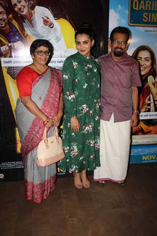 Parvathy with her parents