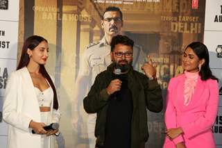 Mrunal Thakur, Nora Fatehi and director Nikkhil Advani were snapped at the trailer launch of Batla House