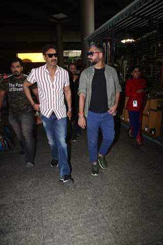 Ajay Devgn and Amit Sharma papped at the airport