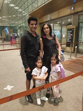 Karanvir Bohra sees off wife Teeajy and his twin girls as they fly off to Canada