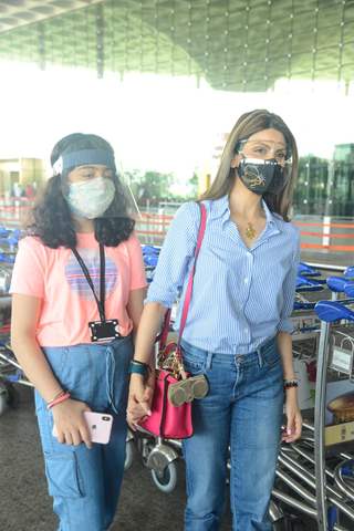 Riddhima Kapoor Sahani snapped departing with her daughter from Mumbai airport