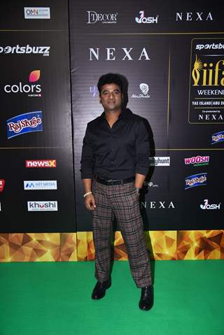 Devi Sri Prasad poses on the green carpet of IIFA awards 2022