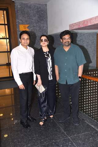 Puri Jagannadh, Charmy Kaur and Apurva Mehta spotted promoting Liger movie at Dharma office in Andheri 