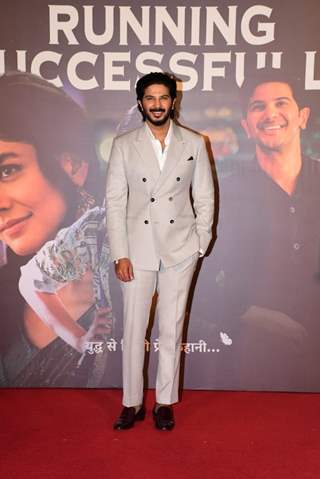 Dulquer Salmaan snapped at Sita Ramam's success press conference in a double breasted, beige suit and trousers
