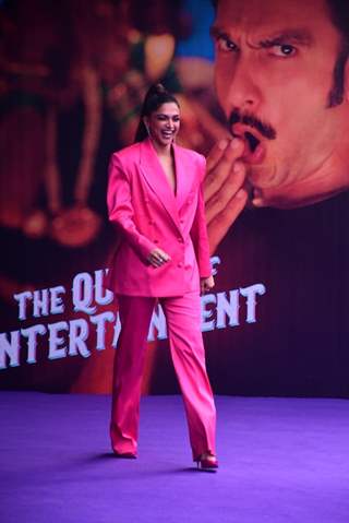 Deepika Padukone looks electrifying in a hot pink, oversized blazer, matching trousers and pumps at the launch of the song #CurrentLaga