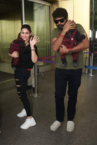 Nayanthara snapped with her child and husband Vignesh Shivan at the Mumbai airport