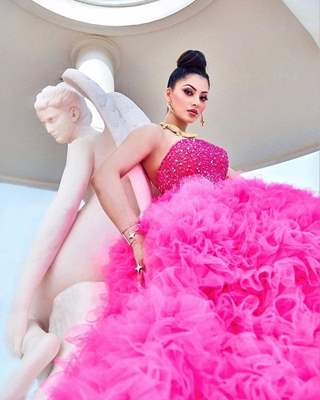 Urvashi Rautela garce the Cannes Film Festival in Pink Tulle Gown and her crocodile jewellery 