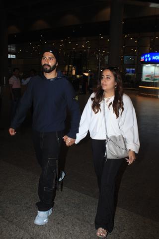 Varun Dhawan and Natasha Dalal snapped at the Mumbai airport 