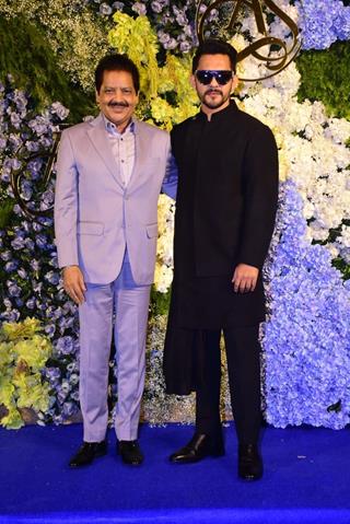 Udit Narayan and Aditya Narayan attend Anand Pandit’s daughter Aishwarya's wedding reception