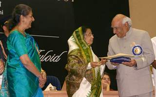 President Pratibha Devi Singh Patil presenting '''' 55th National film award to Yash Chopra on behalf of her son Aditya Chopra at Vigyan Bhawan, in New Delhi on Wednesday, also in photo I and B minister Ambika Soni