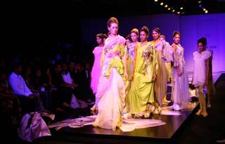 Models showcasing designer Gaurav Gupta''s creation at the Wills Lifestyle India Fashion week in New Delhi on Tuesday 27 Oct 2009