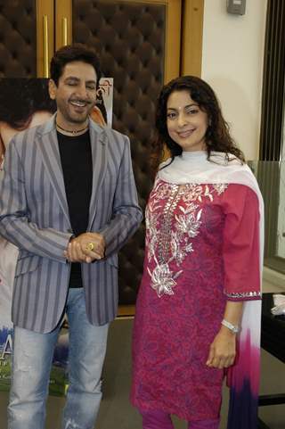 Bollywood actor Gurdas Maan and Juhi Chawla, pose for the photographers during the press conference of film &quot;Sukhmani- Hope for Life&quot; in Mumbai on Thursday, 28 January 2010