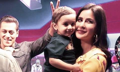 Katrina Kaif posing with a toddler