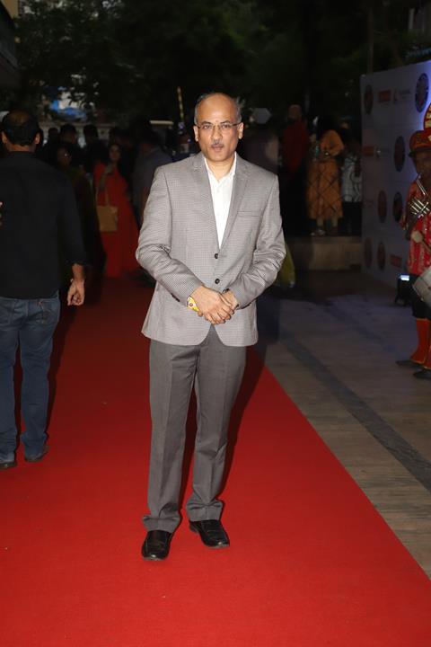 Director Sooraj Barjatya at the screen of his hit film Hum Aapke Hain Koun.