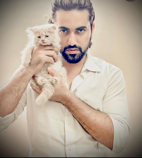 Zain Imam with his cat Coco