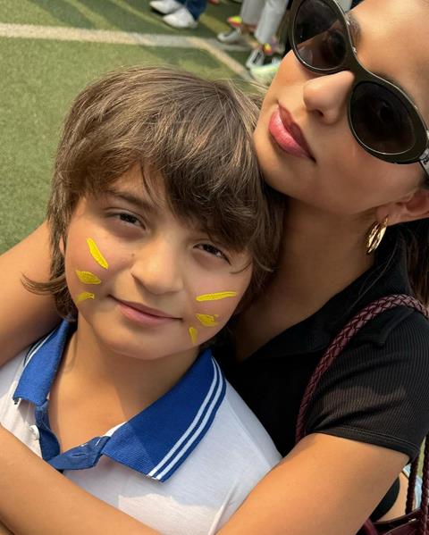 Suhana posing with AbRam, who looked adorable in his school uniform.