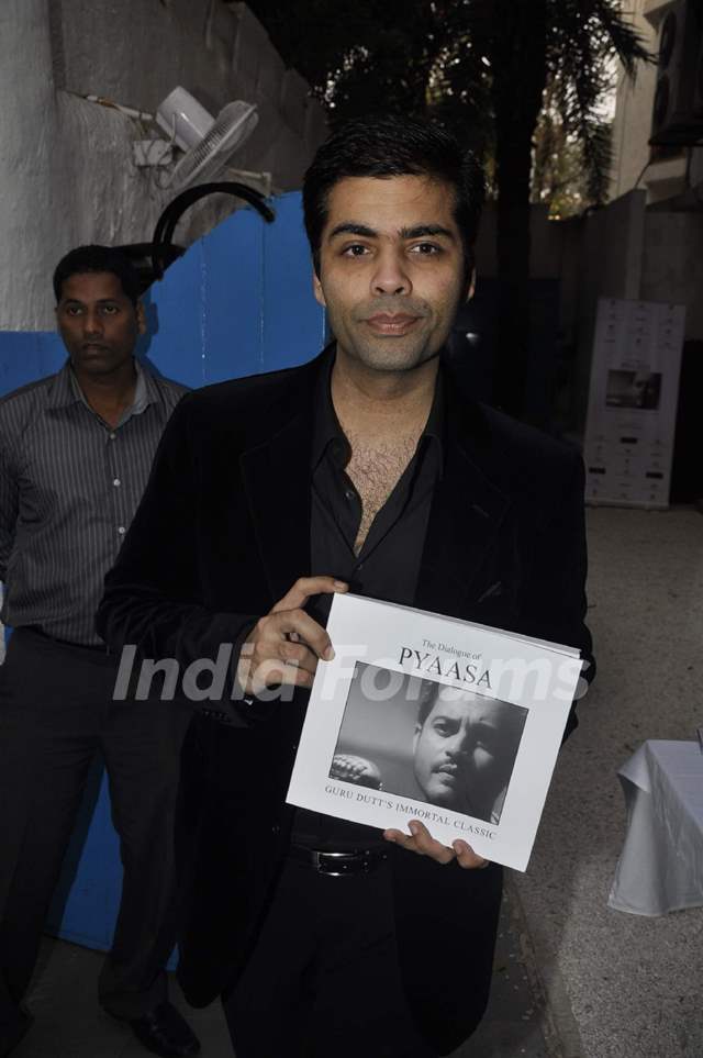 Karan Johar unveils Gurudutt's Pyaasa book at Olive Mumbai. .