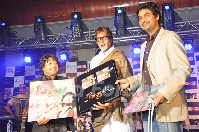 Kailash Kher poses with Amitabh Bachchan during the release of his new album "Kailasha Rangeele"