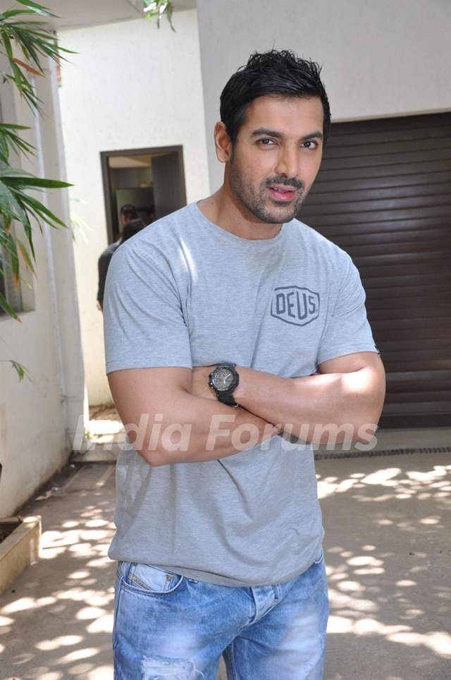 John Abraham gifts his favourite bike to director Sanjay Gupta