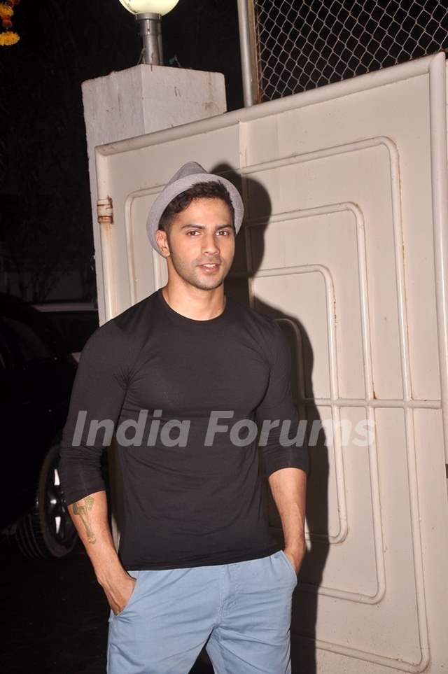 Varun Dhawan poses for the media at the Screening of Finding Fanny