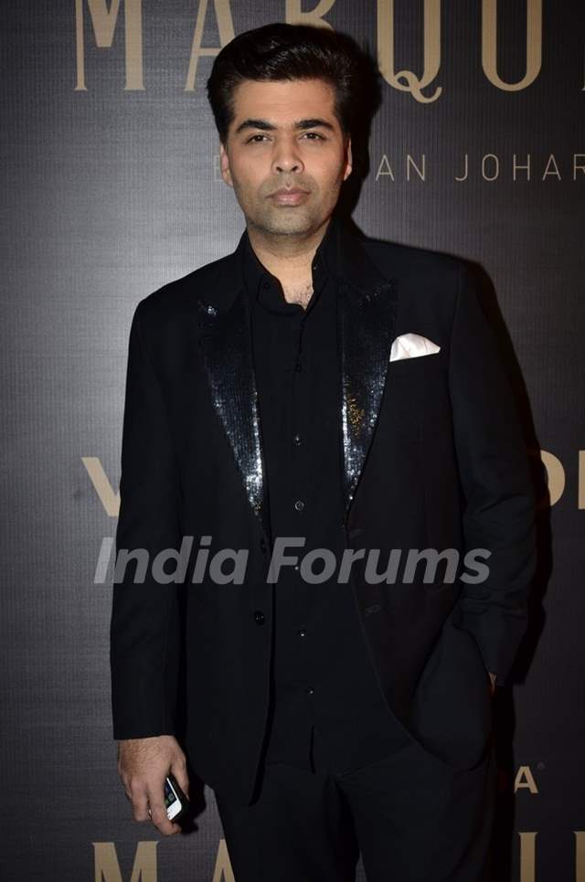 Karan Johar poses for the media at the Launch of Vero Moda MARQUEE Collection