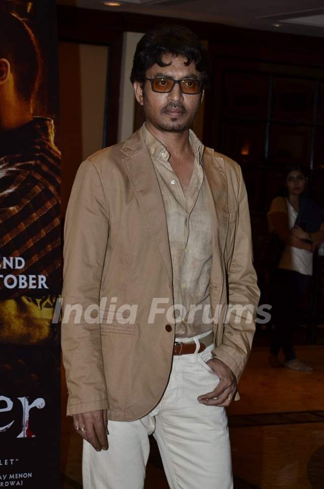 Irrfan Khan poses for the media at the Book Launch of Haider, Omkara and Maqbool