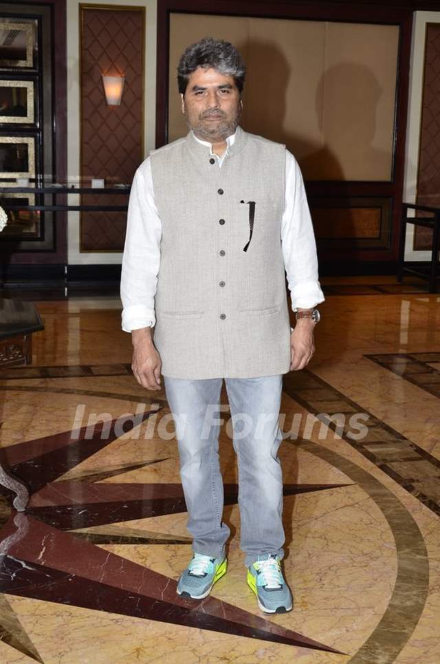 Vishal Bharadwaj poses for the media at the Book Launch of Haider, Omkara and Maqbool