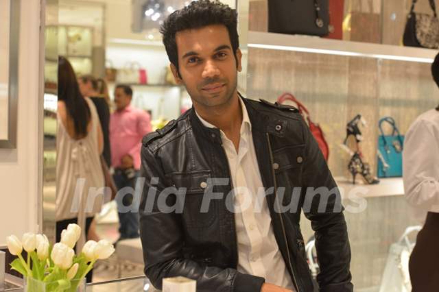 Rajkummar Rao poses for the media at Michael Korrs Store Launch