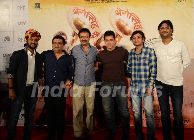 Team of P.K. poses for the media at the Song Launch