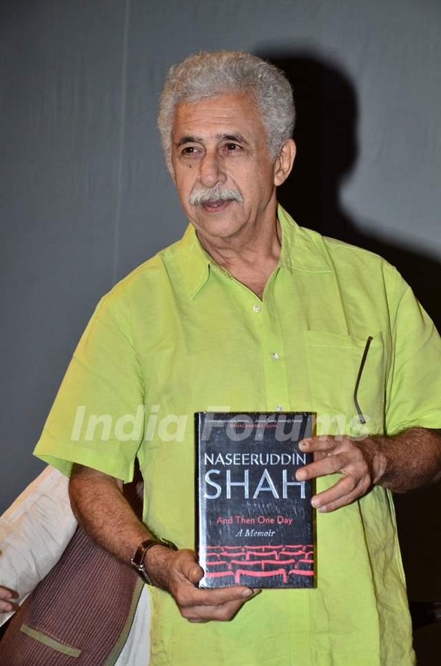 Naseeruddin Shah poses with his Book, 'And Then One Day' at the Launch