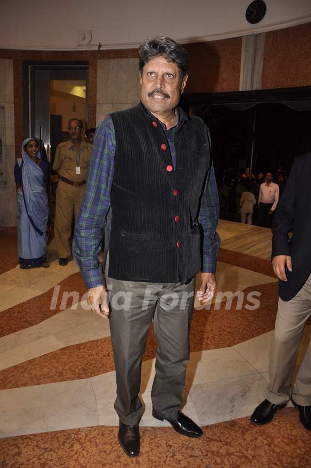 Kapil Dev poses for the media at Camel Colors Exhibition