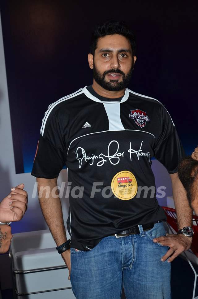 Abhishek Bachchan poses for the media at Barclays Premier League