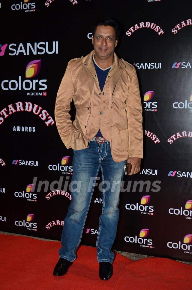 Madhur Bhandarkar poses for the media at Sansui Stardust Awards Red ...