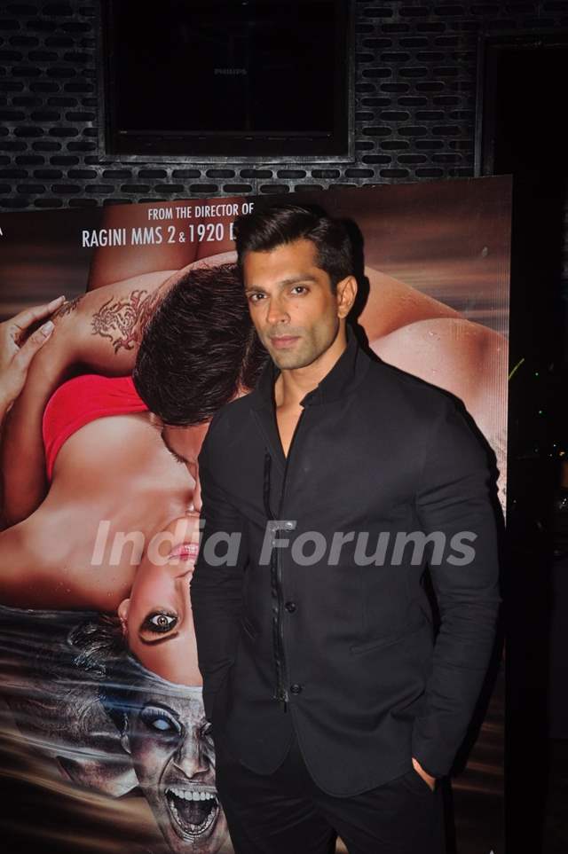 Karan Singh Grover poses for the media at the Success Bash of Alone's Trailer